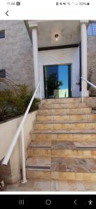 a set of stairs in front of a house at Flat Mina de Ouro 300m Metrô Conceição ao lado SP Expo Congonhas Direto Autódromo in Sao Paulo