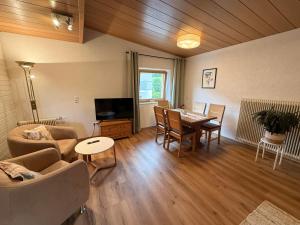 TV a/nebo společenská místnost v ubytování Bergnest Appartements