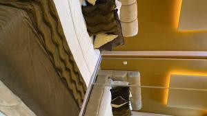 Ένα ή περισσότερα κρεβάτια σε δωμάτιο στο Appartement Moderne Vert