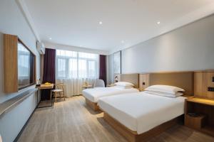 Uma televisão e/ou sistema de entretenimento em Parker Hotel Huangshan Tunxi Old Street Branch
