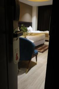 Hotel Hardik Palacio客房内的一张或多张床位