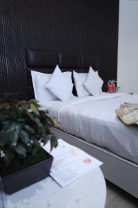 Hotel Hardik Palacio客房内的一张或多张床位