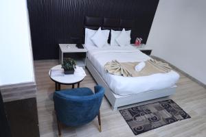 Hotel Hardik Palacio客房内的一张或多张床位