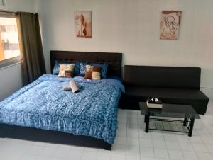 Postel nebo postele na pokoji v ubytování แม่ตังค์ ห้องพักc5