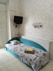 Ένα ή περισσότερα κρεβάτια σε δωμάτιο στο В сердце города! Дерибасовская/Соборная площадь. +30 φωτογραφίες