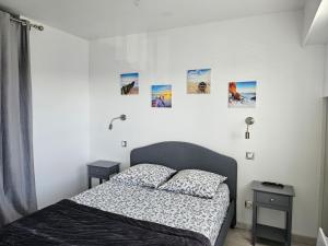 Ένα ή περισσότερα κρεβάτια σε δωμάτιο στο Les Pieds Dans l'Eau