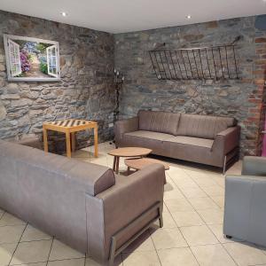 Istumisnurk majutusasutuses Bastogne Maison de vacances avec sauna