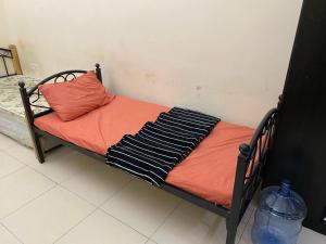 Letto o letti in una camera di سكن شباب بالتعاون - ALEX Hostel - Sharjah