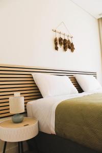 En eller flere senge i et værelse på Beachside Living Gaia Porto by MP + 22 billeder