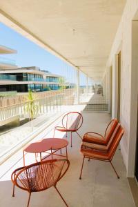 En balkon eller terrasse på Beachside Living Gaia Porto by MP