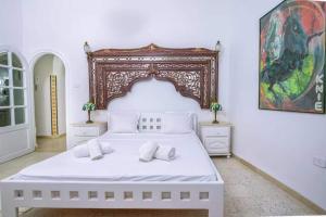 Voodi või voodid majutusasutuse S9 Rooftop and sea view in Sidi Bou Said toas