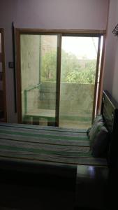 Postel nebo postele na pokoji v ubytování Al Ghani Hostel For Gents