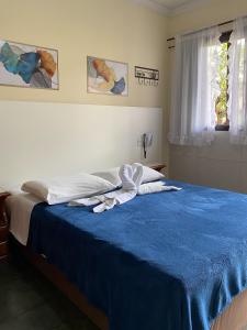 Postel nebo postele na pokoji v ubytování Hotel Casa Encantada