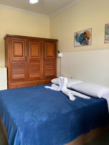 Postel nebo postele na pokoji v ubytování Hotel Casa Encantada