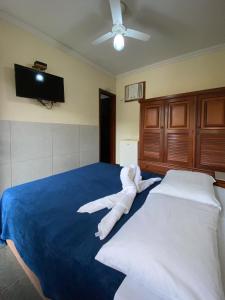 Postel nebo postele na pokoji v ubytování Hotel Casa Encantada