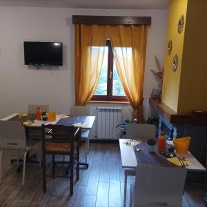 TV a/nebo společenská místnost v ubytování B&B Lo Slittone