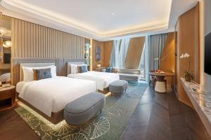 TV a/nebo společenská místnost v ubytování Mandarin Oriental Downtown, Dubai