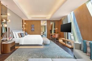 TV a/nebo společenská místnost v ubytování Mandarin Oriental Downtown, Dubai