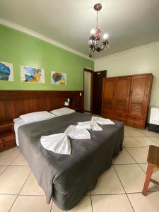 Postel nebo postele na pokoji v ubytování Hotel Casa Encantada