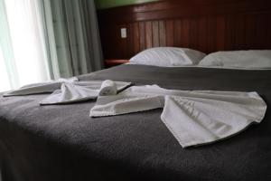 Postel nebo postele na pokoji v ubytování Hotel Casa Encantada
