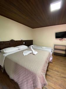 Postel nebo postele na pokoji v ubytování Hotel Casa Encantada