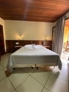 Postel nebo postele na pokoji v ubytování Hotel Casa Encantada