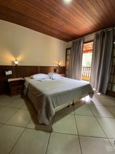Postel nebo postele na pokoji v ubytování Hotel Casa Encantada