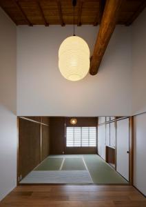 Ένα ή περισσότερα κρεβάτια σε δωμάτιο στο 大津ゲストハウス 栖碩 Seiseki +23 φωτογραφίες