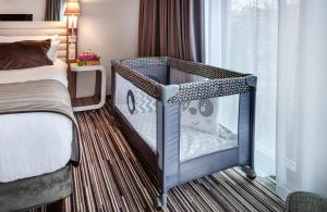 Postel nebo postele na pokoji v ubytování Leonardo Boutique Hotel Krakow City Center