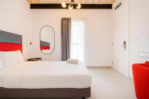 Postel nebo postele na pokoji v ubytování Casa Domenico 5