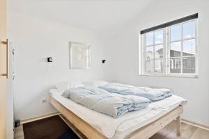 Ένα ή περισσότερα κρεβάτια σε δωμάτιο στο 3331-Hvide-Sande-Anker-Eskildsens-Vej-3-I