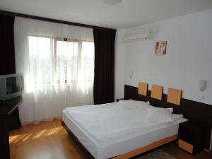 Postel nebo postele na pokoji v ubytování Arion Hotel