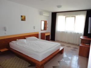 Postel nebo postele na pokoji v ubytování Arion Hotel