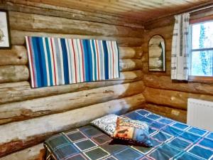 Ένα ή περισσότερα κρεβάτια σε δωμάτιο στο Holiday Home Salmentieva 2 by Interhome