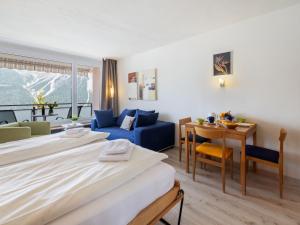 Ένα ή περισσότερα κρεβάτια σε δωμάτιο στο Apartment Promenade - Utoring-59 by Interhome