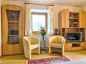 Televisyen dan/atau pusat hiburan di Apartment Lueg ins Land by Interhome