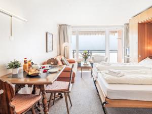 Giường trong phòng chung tại Apartment Promenade - Utoring-69 by Interhome
