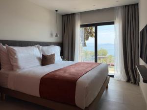 Posteľ alebo postele v izbe v ubytovaní Valmar Corfu