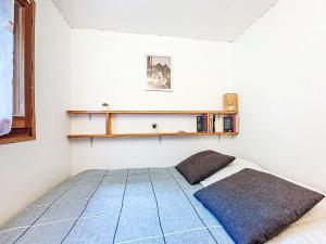 En eller flere senge i et værelse på Apartment Pointe des aravis B13 by Interhome