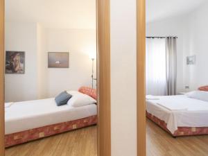 Posteľ alebo postele v izbe v ubytovaní Apartment Anđa-4 by Interhome