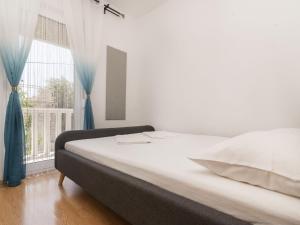 Postel nebo postele na pokoji v ubytování Apartment Anđa-2 by Interhome