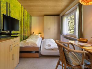 Voodi või voodid majutusasutuse Apartment Promenade - Utoring-13 by Interhome toas