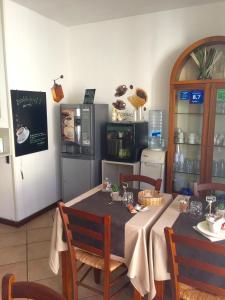Restoran või mõni muu söögikoht majutusasutuses Il Fiordaliso Foresteria