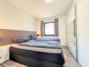 Ένα ή περισσότερα κρεβάτια σε δωμάτιο στο Apartment Dornröschen by Interhome