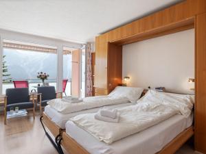 Ένα ή περισσότερα κρεβάτια σε δωμάτιο στο Apartment Promenade - Utoring-92 by Interhome