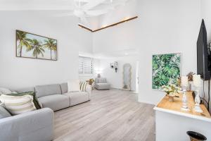 Μια τηλεόραση ή/και κέντρο ψυχαγωγίας στο Golden Palms Pool House