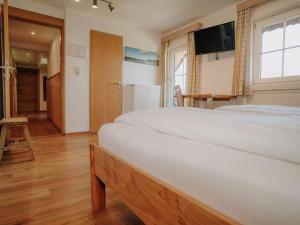 Postel nebo postele na pokoji v ubytování Apartment Grimming by Interhome