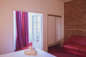 Katil atau katil-katil dalam bilik di Le Clocher de Rodez Centre Gare
