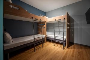 Ibis Budget Guarulhos Aeroporto客房内的一张或多张床位
