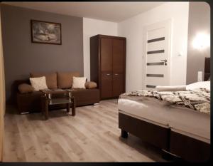Posteľ alebo postele v izbe v ubytovaní Apartament Glamour